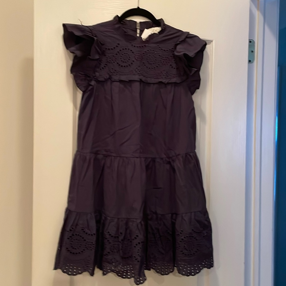 A-line cotton sun dress. Ruffled neck and sleeves. Navy.